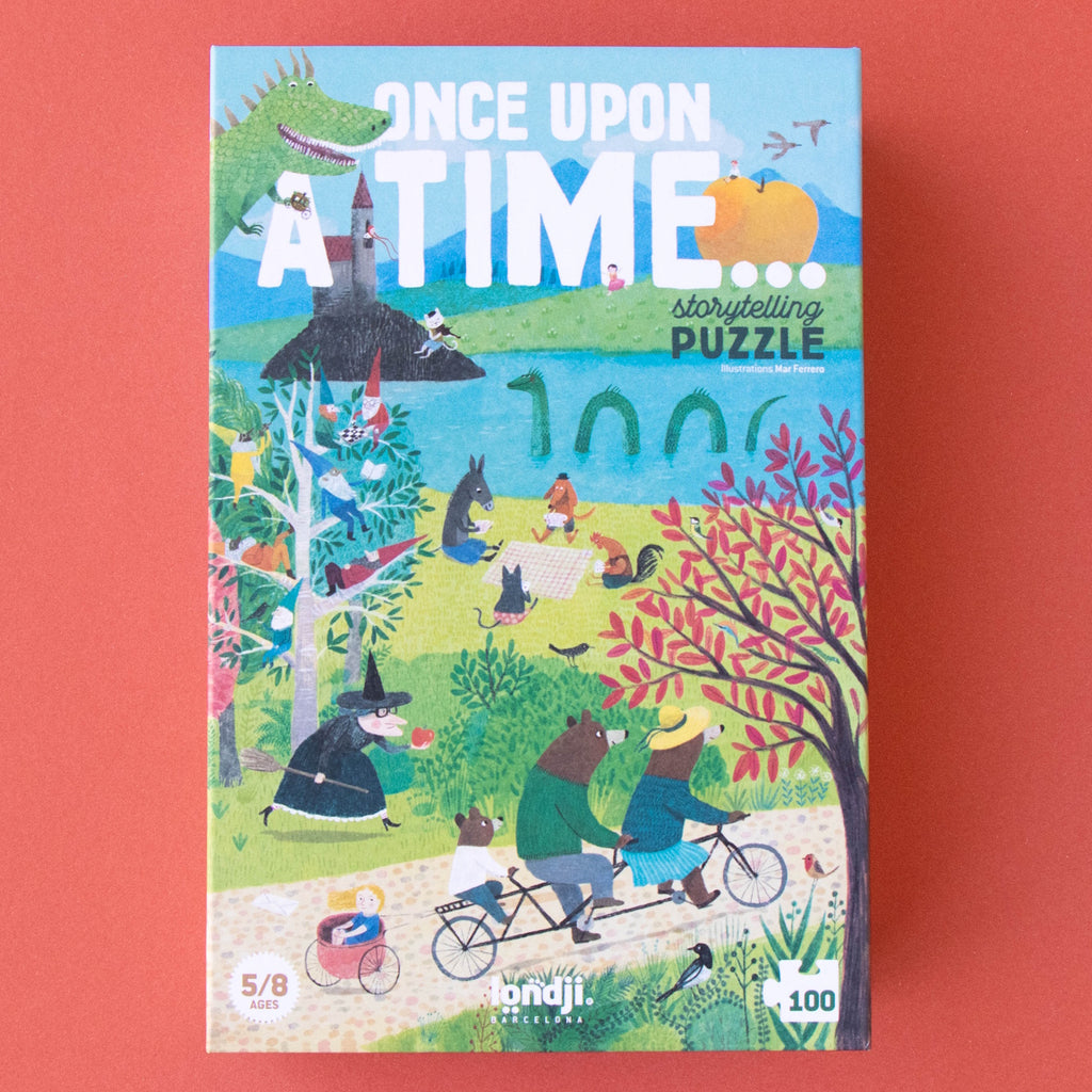Puzzle box cover titled "Once Upon a Time" against a red background, featuring whimsical woodland animals and characters in a colorful, fairytale setting.