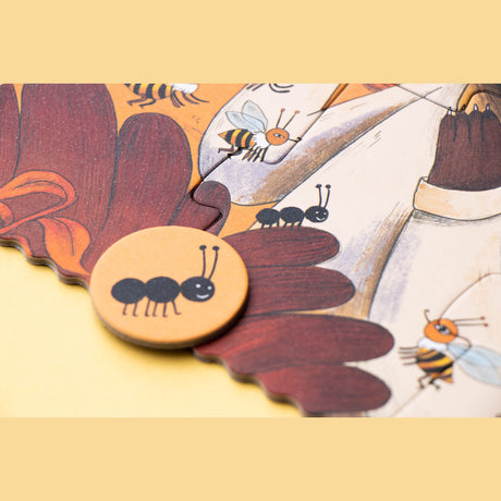 Londji Bears Forest puzzle pieces showing an ant disc and illustrations of bees and forest creatures.