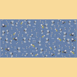 Londji puzzle featuring a whimsical dragonfly and fairy pattern on a blue background with a scalloped edge.