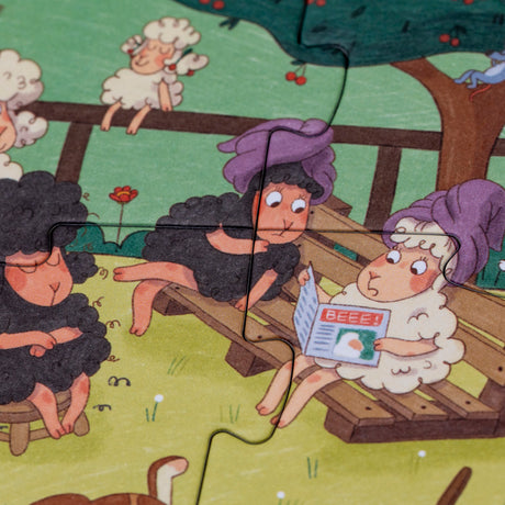 Close-up of Londji Farmtastic puzzle pieces showing funny sheep with purple towels reading a "BEEE!" newspaper.