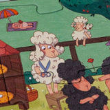 Illustration of a sheep holding scissors next to a black sheep from a Londji Farmtastic jigsaw puzzle.