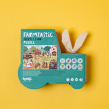 Londji Farmtastic Look & Find 36-piece jigsaw puzzle in tractor-shaped box with fabric ears on yellow background.