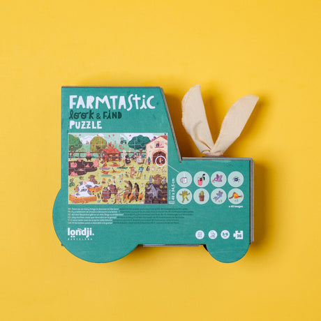 Londji Farmtastic Look & Find 36-piece jigsaw puzzle in tractor-shaped box with fabric ears on yellow background.