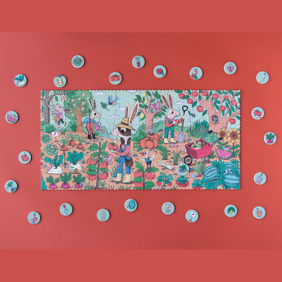 Londji Rabbits Garden puzzle with illustrated bunnies gardening, surrounded by circular search-and-find game tokens.