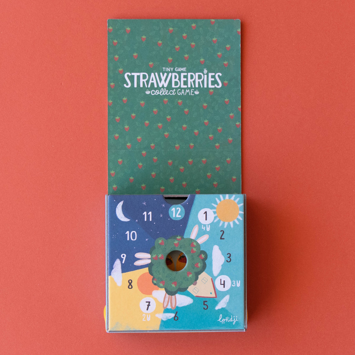Londji Strawberries Collect Game box and instruction card featuring a colorful clock face and strawberry pattern.