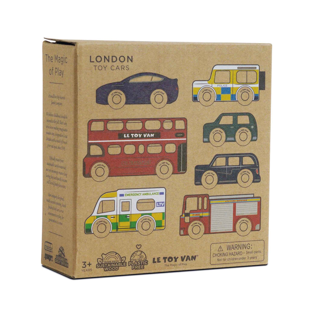 Box of wooden London Toy Cars, featuring a car, police car, double-decker bus, ambulance, taxi, and fire truck. Made from sustainable wood.
