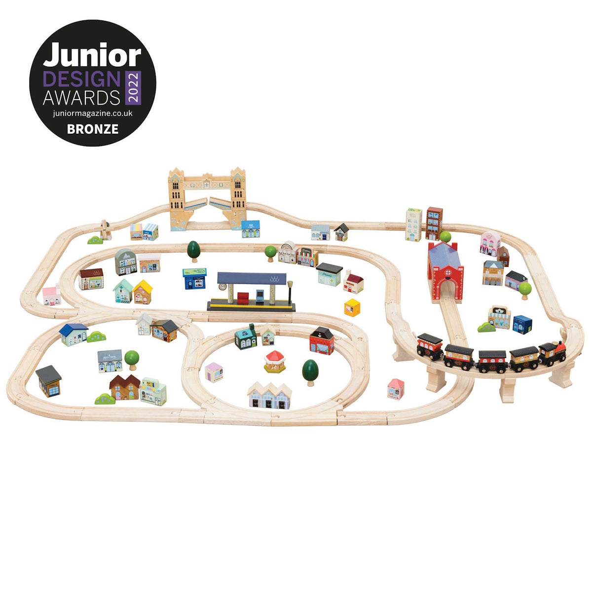Wooden train set with tracks, bridge, and buildings, with a Junior Design Awards 2022 logo.