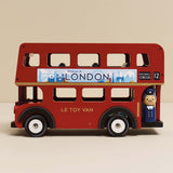 Red wooden double-decker London toy bus with a driver figure.