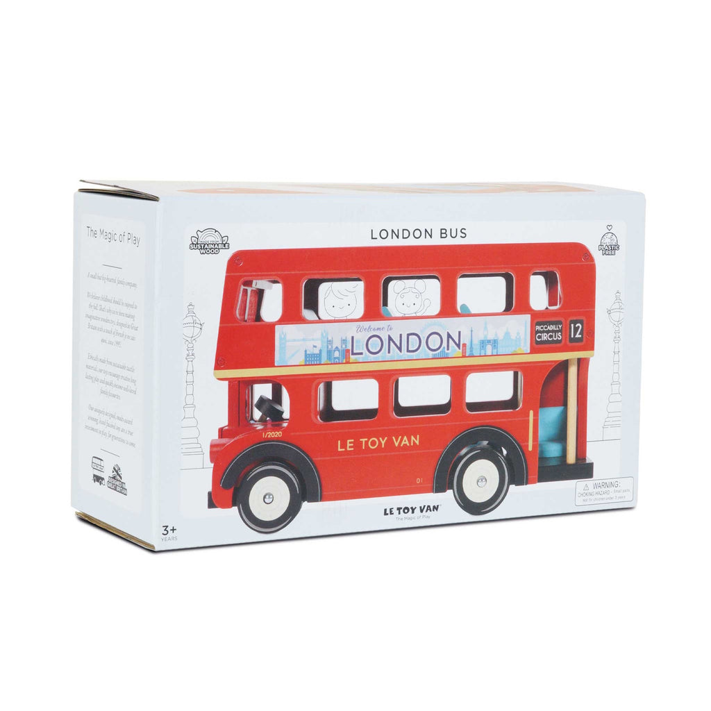 Toy box showing a bright red wooden London bus with smiling passengers, labeled "Le Toy Van." Emphasizes playfulness and imagination.