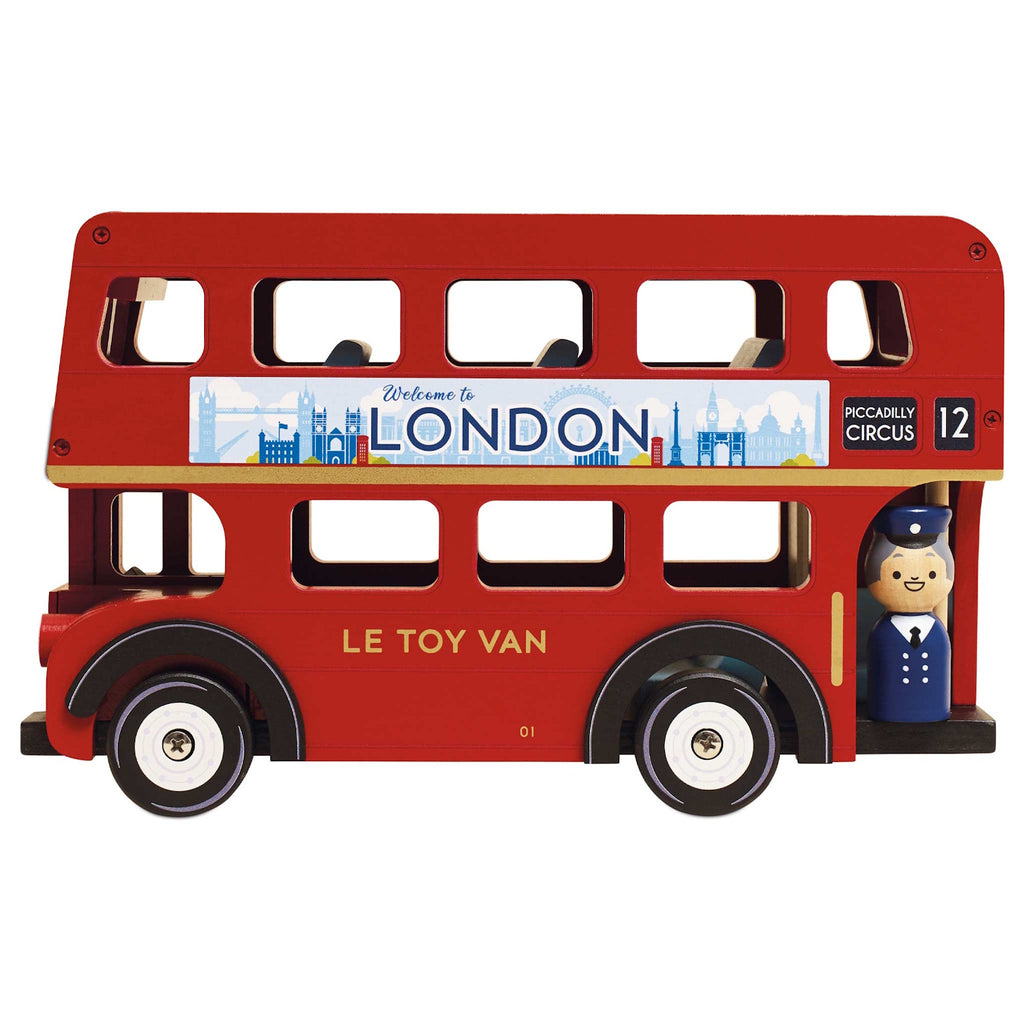 Toy red double-decker bus with a "Welcome to London" sign, featuring a wooden driver figure.