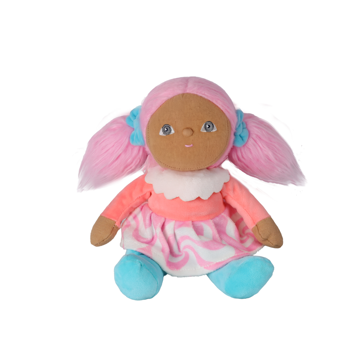 Front view of a plush doll sitting upright with pink pigtails and a swirl skirt on white background.