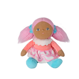 Front view of a plush doll sitting upright with pink pigtails and a swirl skirt on white background.