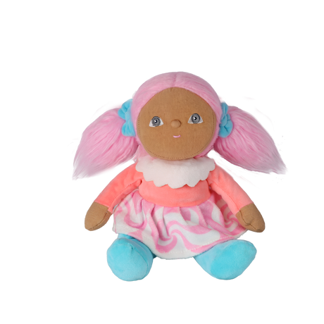 Front view of a plush doll sitting upright with pink pigtails and a swirl skirt on white background.
