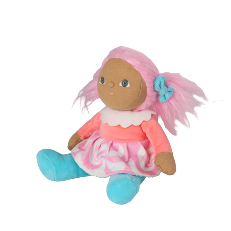 Seated plush doll with pink pigtails, a swirl dress, and blue boots angled on a white background.