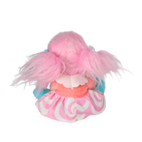 Top-down back view of a plush doll sitting with pink pigtails against a white background.
