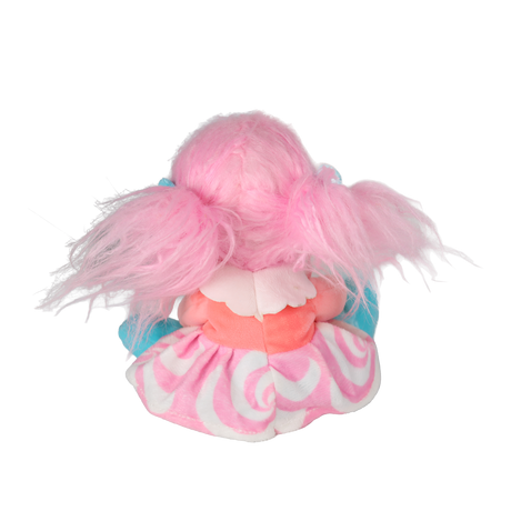 Top-down back view of a plush doll sitting with pink pigtails against a white background.