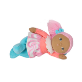 Plush doll with pink pigtails lying on its side against a white background.