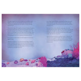 Undersea children's book spread with mermaid story text, pink coral, and seashells on a purple ocean floor.