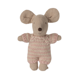 A cute fabric mouse toy with large ears and a tiny smile is wearing a pink knitted outfit. The toy conveys a playful and cozy feel.