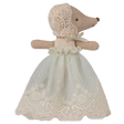 A fabric mouse doll in a delicate lace dress and bonnet stands against a white background. The doll's soft attire gives a vintage, elegant feel.