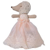 A plush mouse toy dressed in a delicate pink lace gown and bonnet, set against a white background. The toy exudes a vintage, whimsical charm.