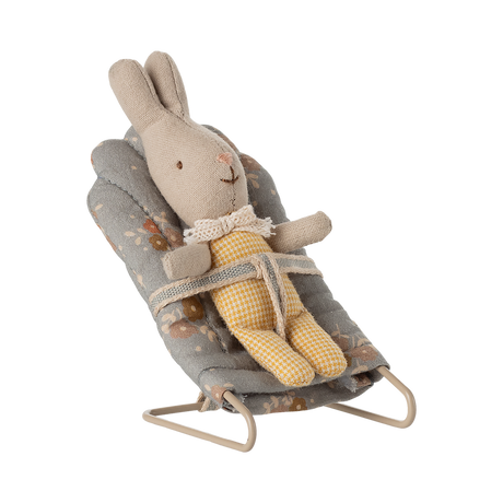 Miniature gray floral baby chair with soft padding and metal frame. It features a harness, scattered orange and brown flowers, and a cozy, vintage feel.