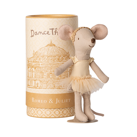 A mouse doll in a tutu and headband stands cheerfully beside a cylindrical box. The box features "Romeo & Juliet" and a theater illustration.