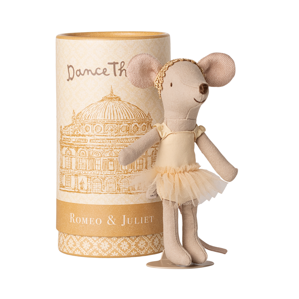 A mouse doll in a tutu and headband stands cheerfully beside a cylindrical box. The box features "Romeo & Juliet" and a theater illustration.