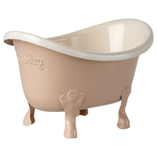 Small beige ceramic bathtub with clawfoot legs and embossed text on the side, set against a white background. The tub has a glossy finish.