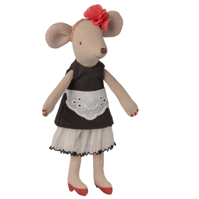 Toy mouse dressed in a black dress with a white lace apron, red shoes, and a pink flower headband. The mouse stands against a white background.