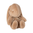 A plush, light brown stuffed bunny with long ears sits upright. It has a simple facial expression and wears a bow, conveying a sense of softness and warmth.