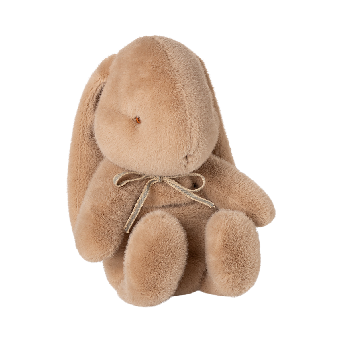 A plush, light brown stuffed bunny with long ears sits upright. It has a simple facial expression and wears a bow, conveying a sense of softness and warmth.