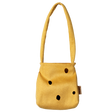 Maileg cheese bag accessory for medium mouse dolls, featuring a yellow Swiss cheese design with holes.