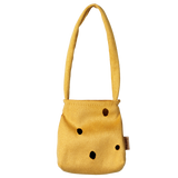 Maileg cheese bag accessory for medium mouse dolls, featuring a yellow Swiss cheese design with holes.