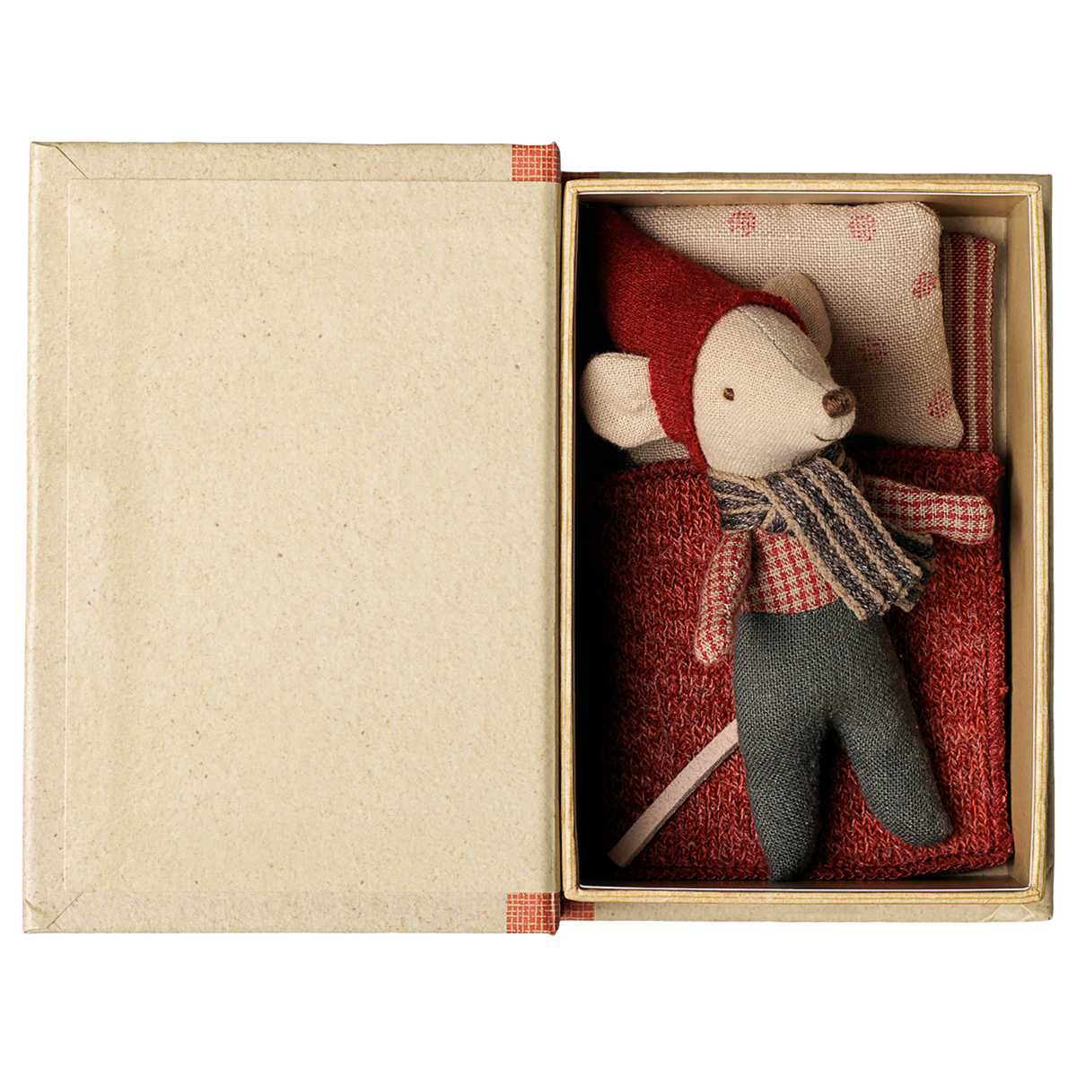 Maileg Christmas mouse toy sleeping in an open book-shaped box with bedding.