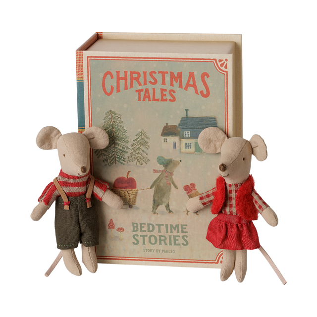 Maileg Christmas twin mice, little brother and sister, standing next to a bedtime stories book box.