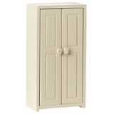 A small cream-colored cupboard with two panelled doors, each featuring a round flower-patterned knob, set against a plain white background.