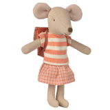 Stuffed toy mouse in a striped orange and white top, orange plaid skirt, and backpack. The toy's ears are oversized, giving it a playful look.