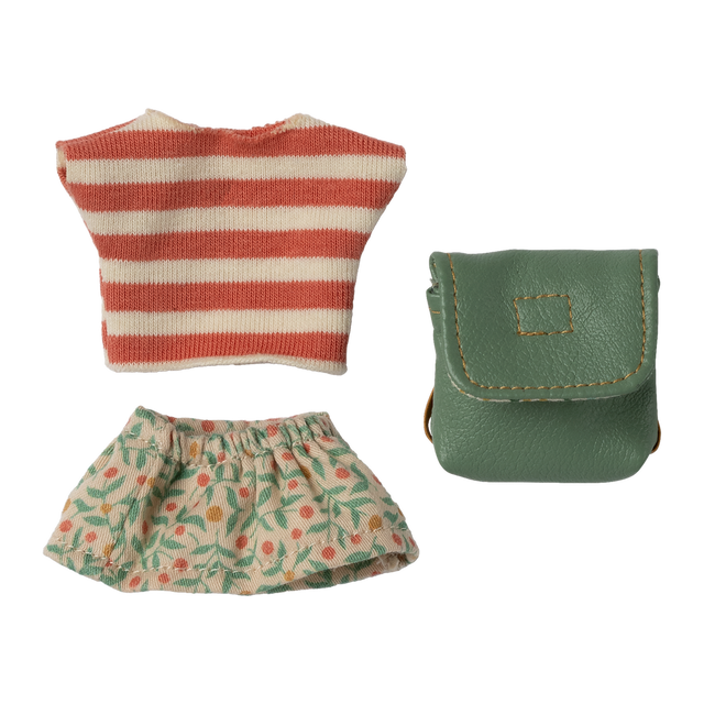 Striped red and white top, floral-patterned green skirt, and a teal leather pouch on a white background. The items appear playful and colorful.