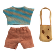 Knitted doll clothes on black background: blue and orange striped top, orange shorts, and yellow bag with brown spots. Casual and playful design.