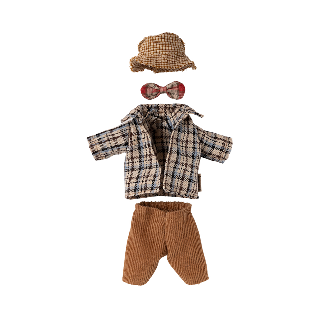 Plaid doll outfit with beige pants, houndstooth hat, and red plaid bow tie. Arranged neatly against a plain background, evoking a vintage charm.