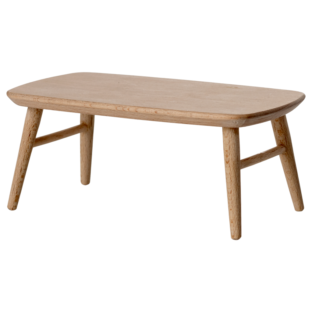 Miniature light wooden coffee table with a smooth, rounded top and tapered legs, adding a minimalist touch to any space.