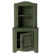 Green wooden corner miniature cabinet with an open lower door. It features two shelves above and a decorative knob. The piece conveys a rustic, vintage charm.