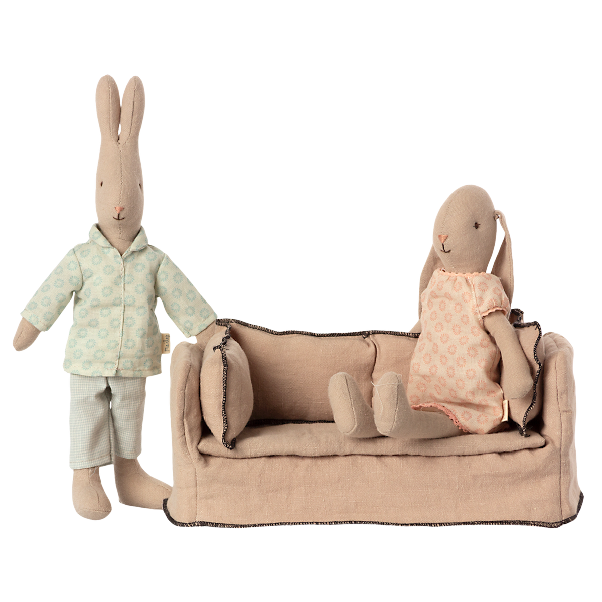 Beige fabric dollhouse sofa with three cushioned backrests, trimmed in dark stitching. The cozy design suggests a miniature living room setting.