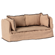 Beige fabric dollhouse sofa with three cushioned backrests, trimmed in dark stitching. The cozy design suggests a miniature living room setting.