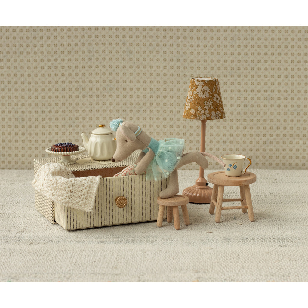 A sweet ballerina mouse in a polka dot outfit, resting on a cozy, vintage-style metal daybed with soft bedding—perfect for imaginative play and dollhouse scenes.