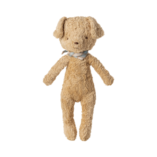 A plush light brown dog toy with floppy ears, wearing a brown collar, stands upright against a white background.