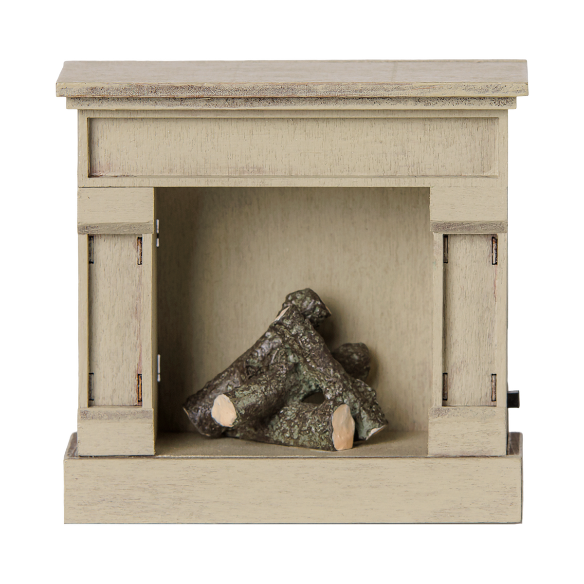 Miniature off-white dollhouse fireplace with tiny logs inside on a white background.