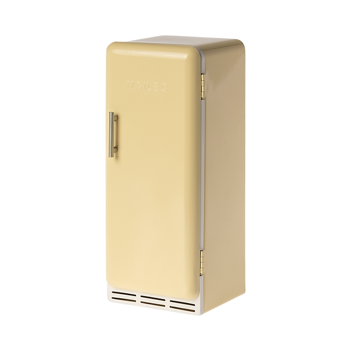 A toy refrigerator in a pale yellow color, is shown with its door slightly ajar. The fridge has a retro design with rounded edges, a silver-colored handle on the right side of the door, and the word "MAILEG" embossed vertically on the door. Inside, three shelves with ribbed textures are visible.