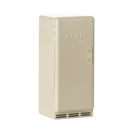 Vintage-style miniature cream fridge with a metal handle, featuring a simple design and embossed MAILEG text, evokes a nostalgic charm.
